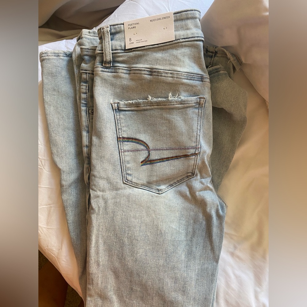 LIMITED EDITION PRIDE FESTIVAL AMERICAN EAGLE FESTIVAL FLARE JEANS HIGH WAISTED